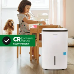 Honeywell TP70WKNR 50 Pint (70 Pint 2019 DOE Standard) Energy Star Portable Dehumidifier With Mirage Display, White -Fit Machines Hub USA DEH TP70WKN CR Girl with dog